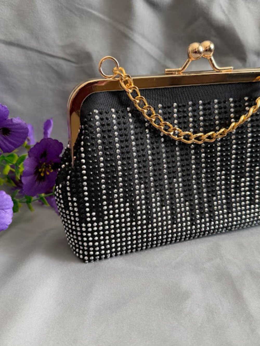 elegant black clutch a delica gold chain